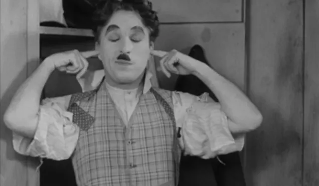 Charlie Chaplin en City Lights, 1931, la imagen principal del ensayo